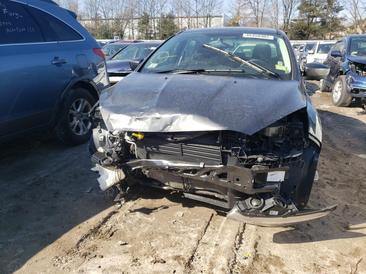 Photo 7 from auction – 2018 FORD FOCUS SE with VIN 1FADP3F22JL237571