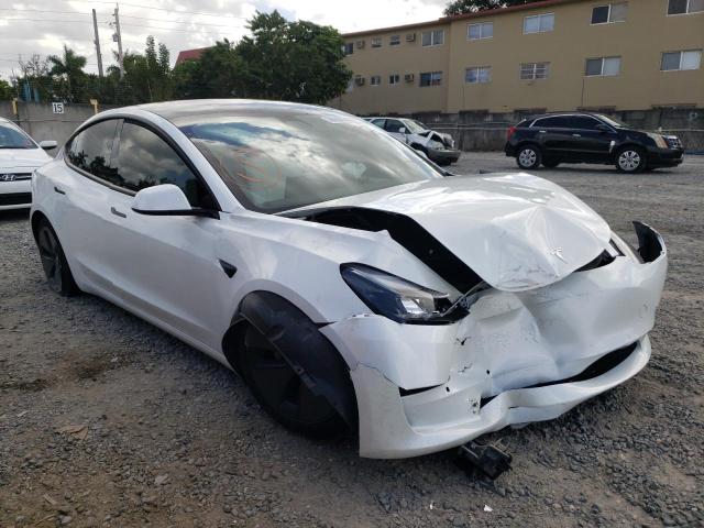TESLA MODEL 3 2021 with VIN 5YJ3E1EA4MF989658 - Photo from auction