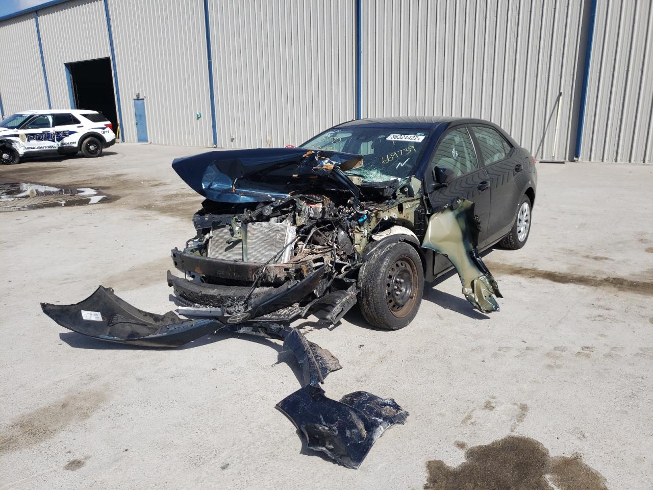 Photo 2 from auction – 2017 TOYOTA COROLLA L with VIN 5YFBURHE7HP669739