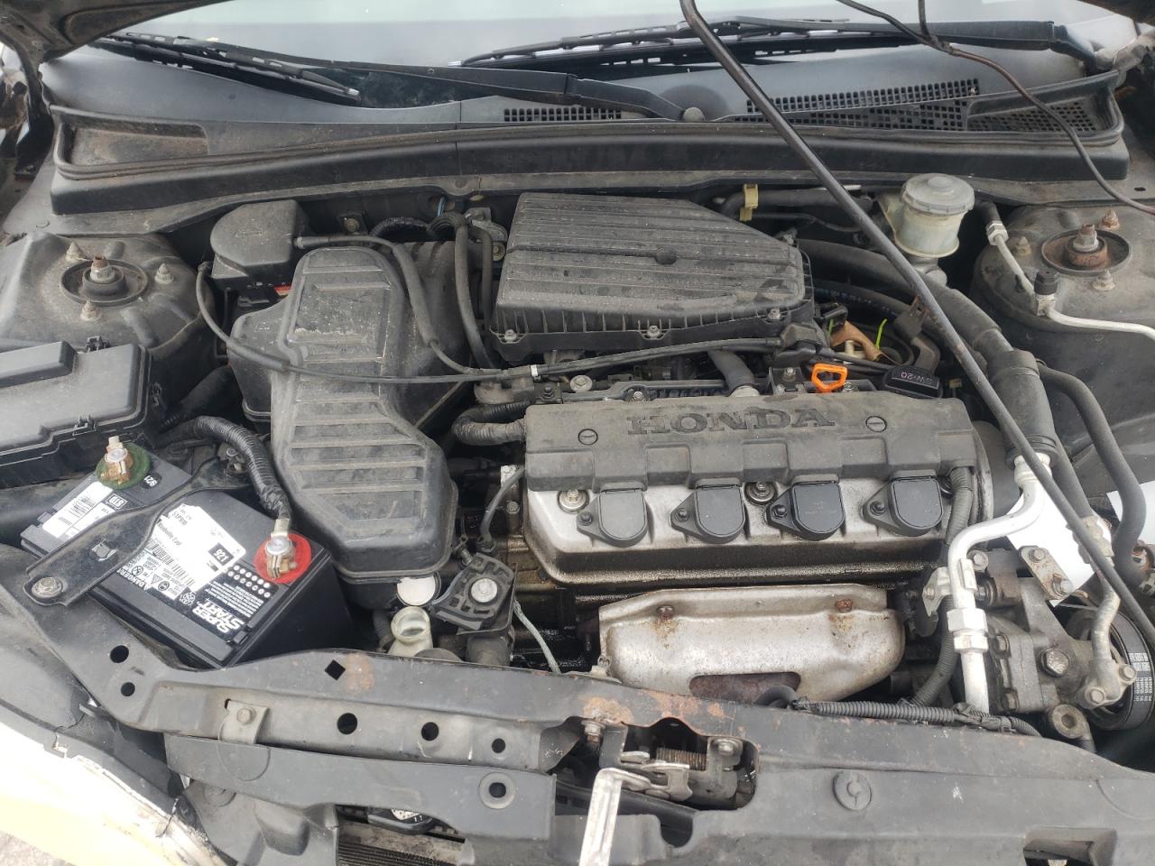 Photo 7 from auction – 2002 HONDA CIVIC LX with VIN 2HGES16522H555508