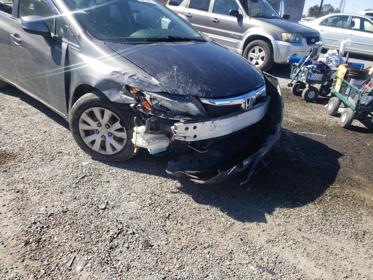 Photo 9 from auction – 2012 HONDA CIVIC LX with VIN 2HGFB2F57CH585339
