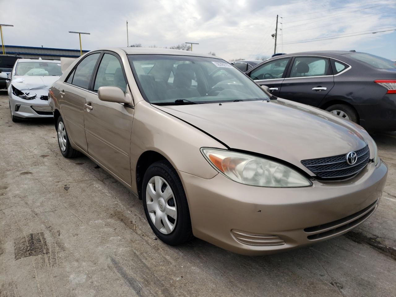 TOYOTA CAMRY LE 2004 with VIN 4T1BE32K74U336703 - Photo from auction