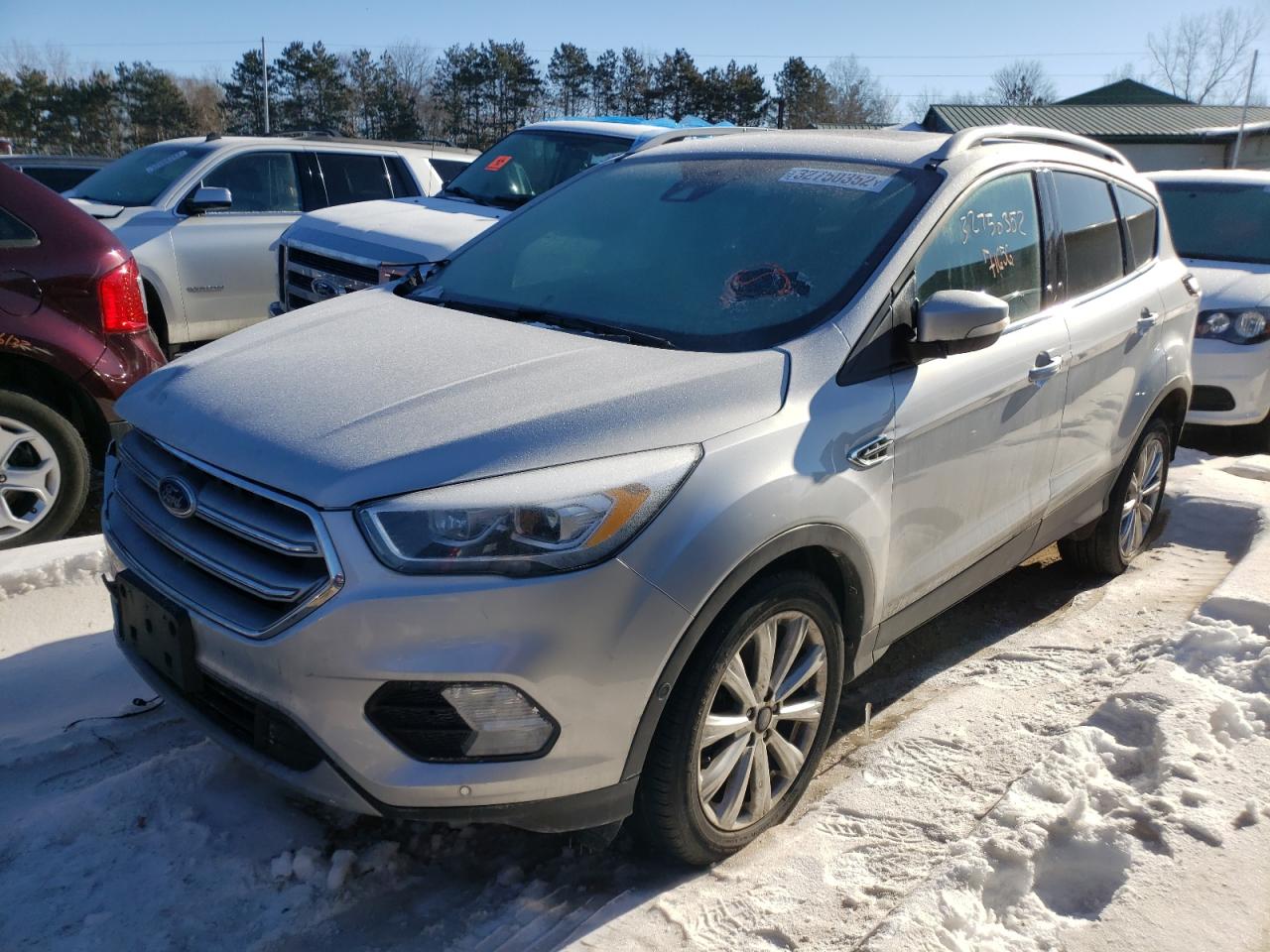Photo 2 from auction – 2017 FORD ESCAPE TIT with VIN 1FMCU9J90HUE78650