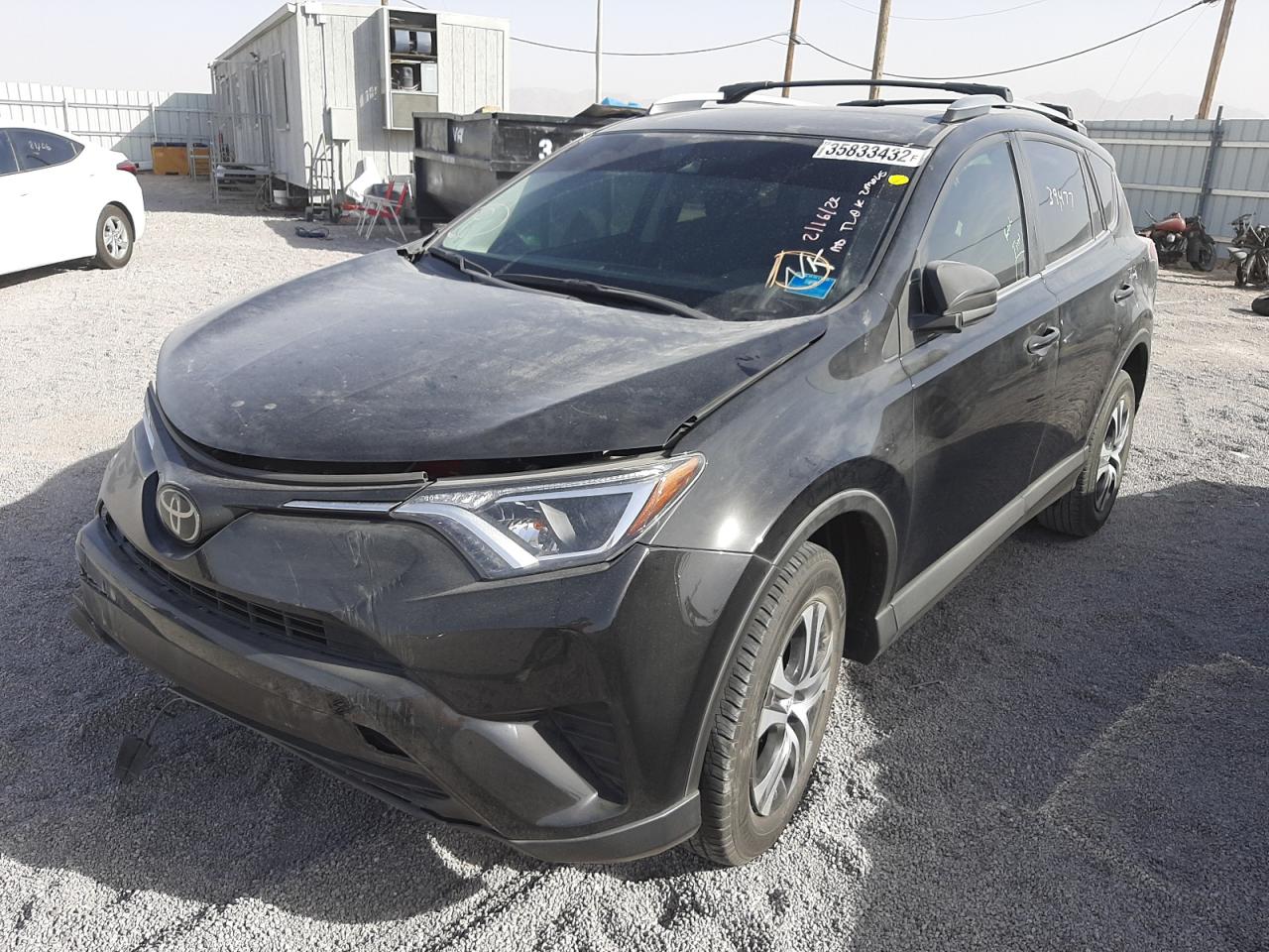 Photo 2 from auction – 2018 TOYOTA RAV4 LE with VIN 2T3ZFREV8JW414431