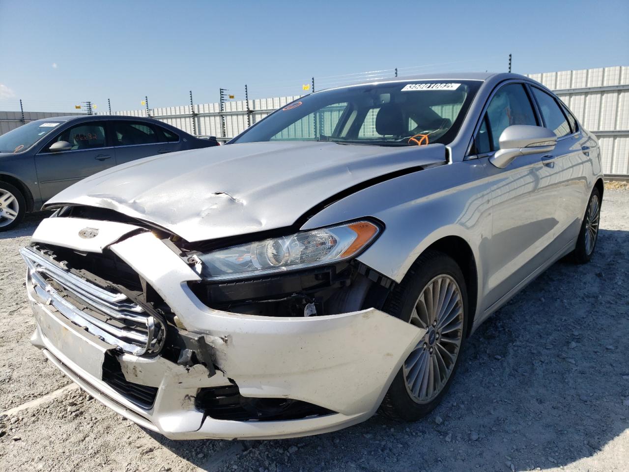 Photo 2 from auction – 2016 FORD FUSION TIT with VIN 3FA6P0K93GR387726