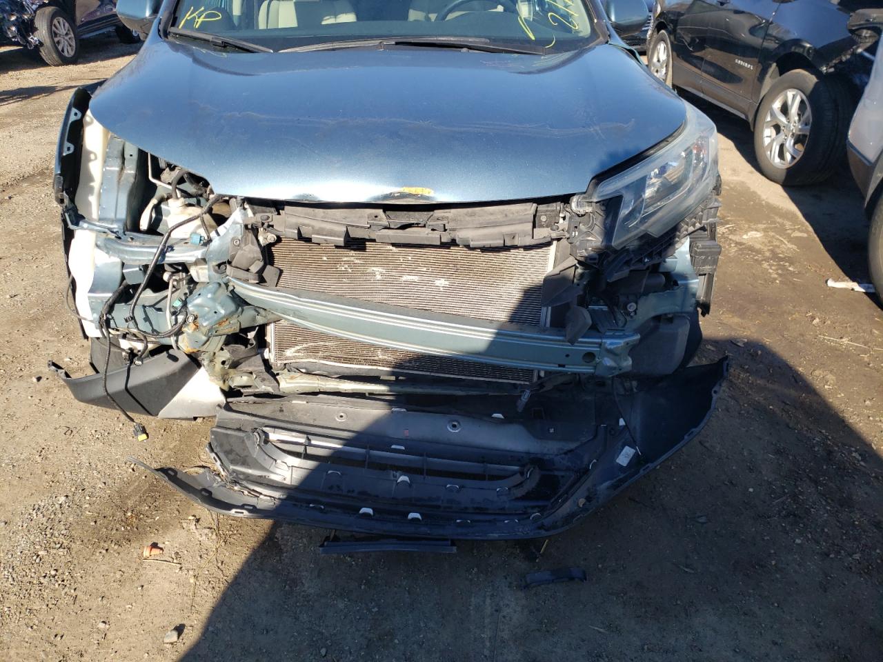 Photo 9 from auction – 2015 HONDA CR-V EX with VIN 2HKRM4H59FH705958