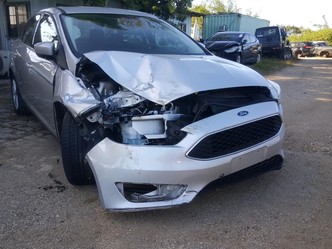 Photo 9 from auction – 2018 FORD FOCUS SE with VIN 1FADP3F25JL304910
