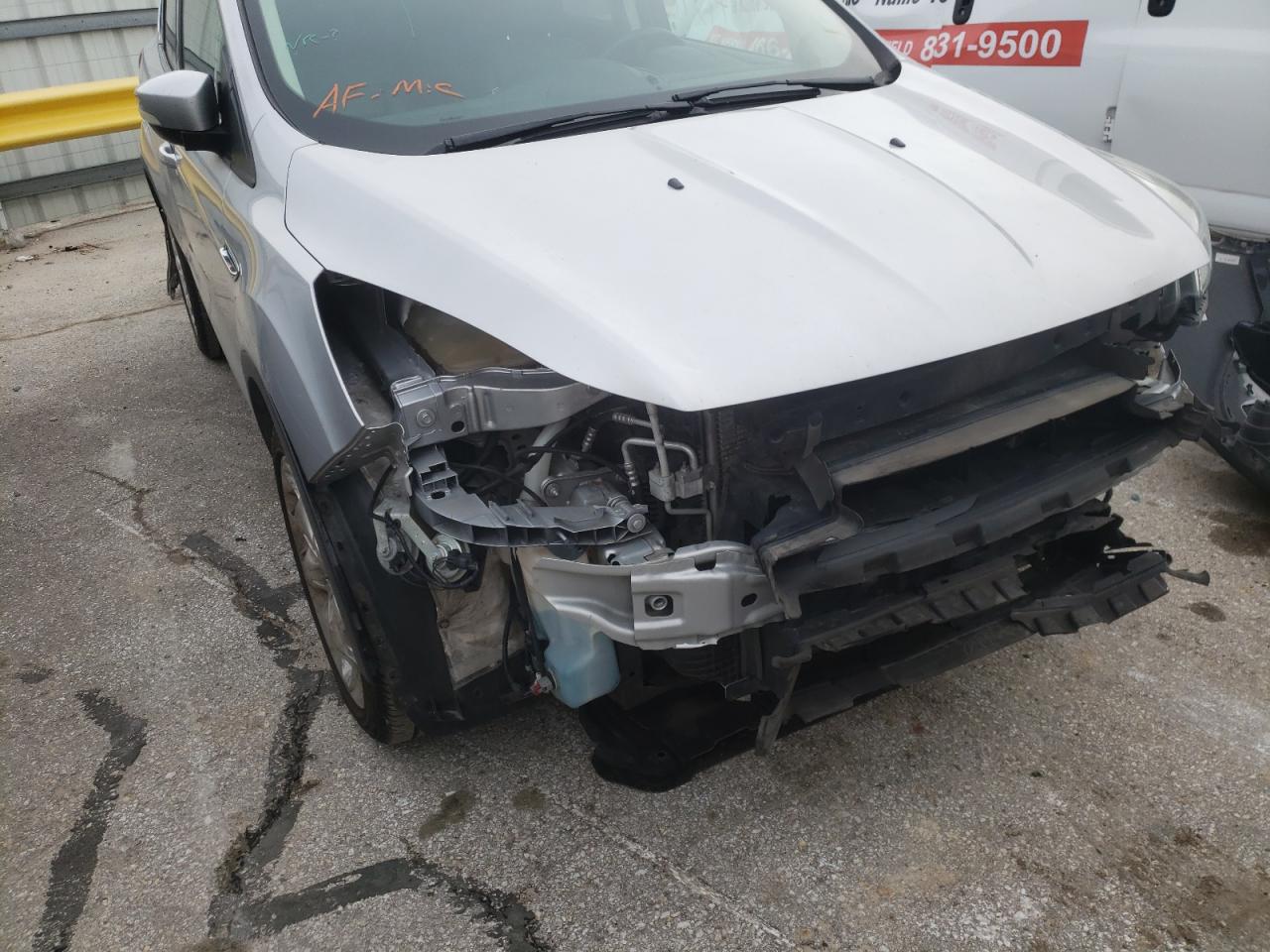 Photo 9 from auction – 2016 FORD ESCAPE TIT with VIN 1FMCU0J99GUA84316