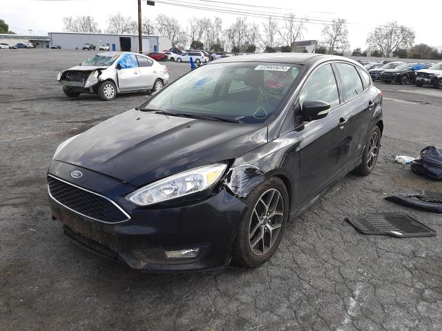 Photo 2 from auction – 2015 FORD FOCUS SE with VIN 1FADP3K29FL220912
