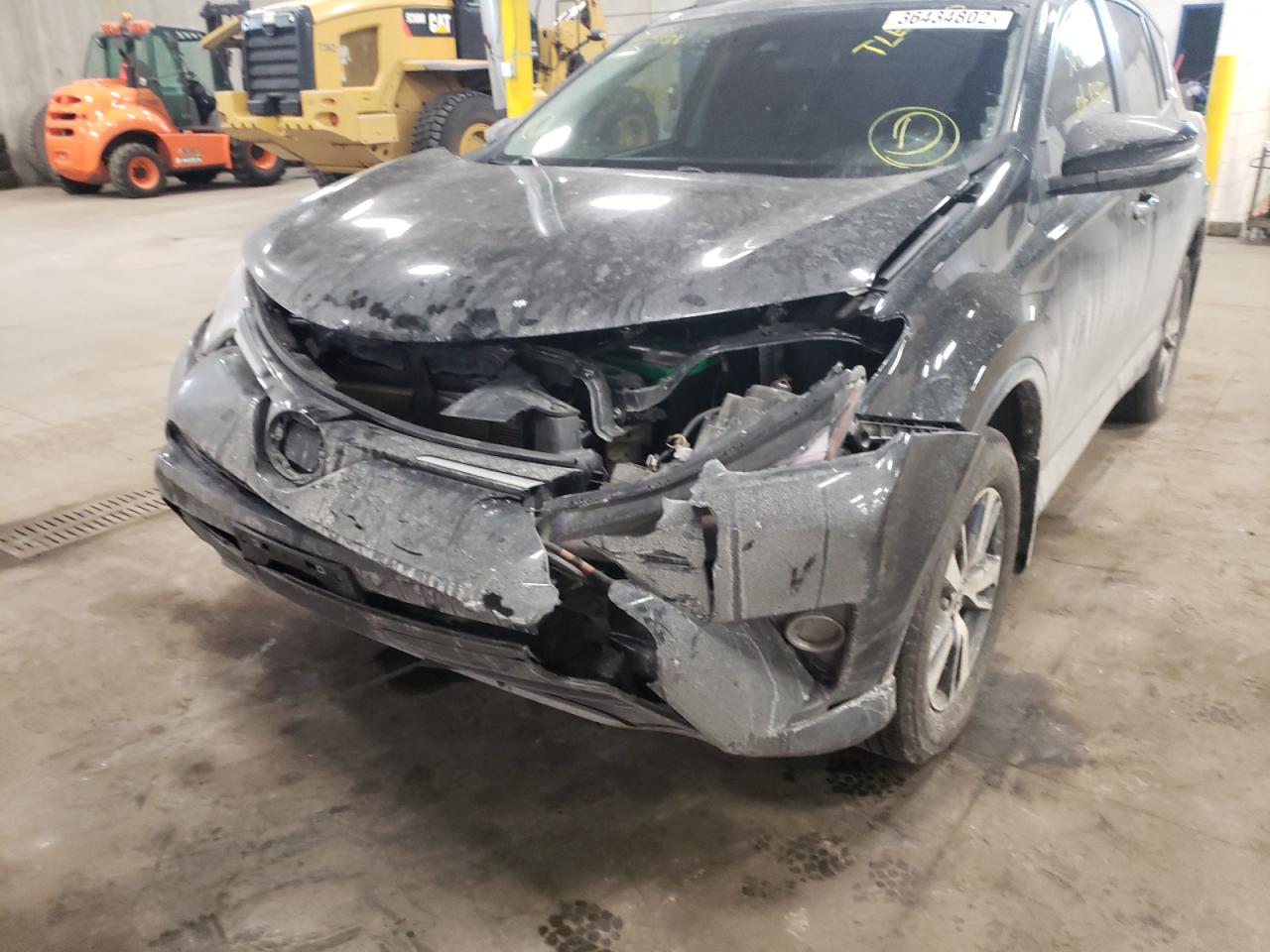 Photo 9 from auction – 2017 TOYOTA RAV4 XLE with VIN 2T3RFREV8HW632184