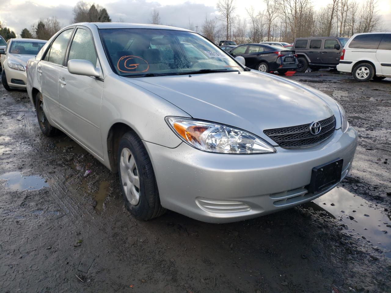 TOYOTA CAMRY LE 2004 with VIN 4T1BE32K04U911630 - Photo from auction