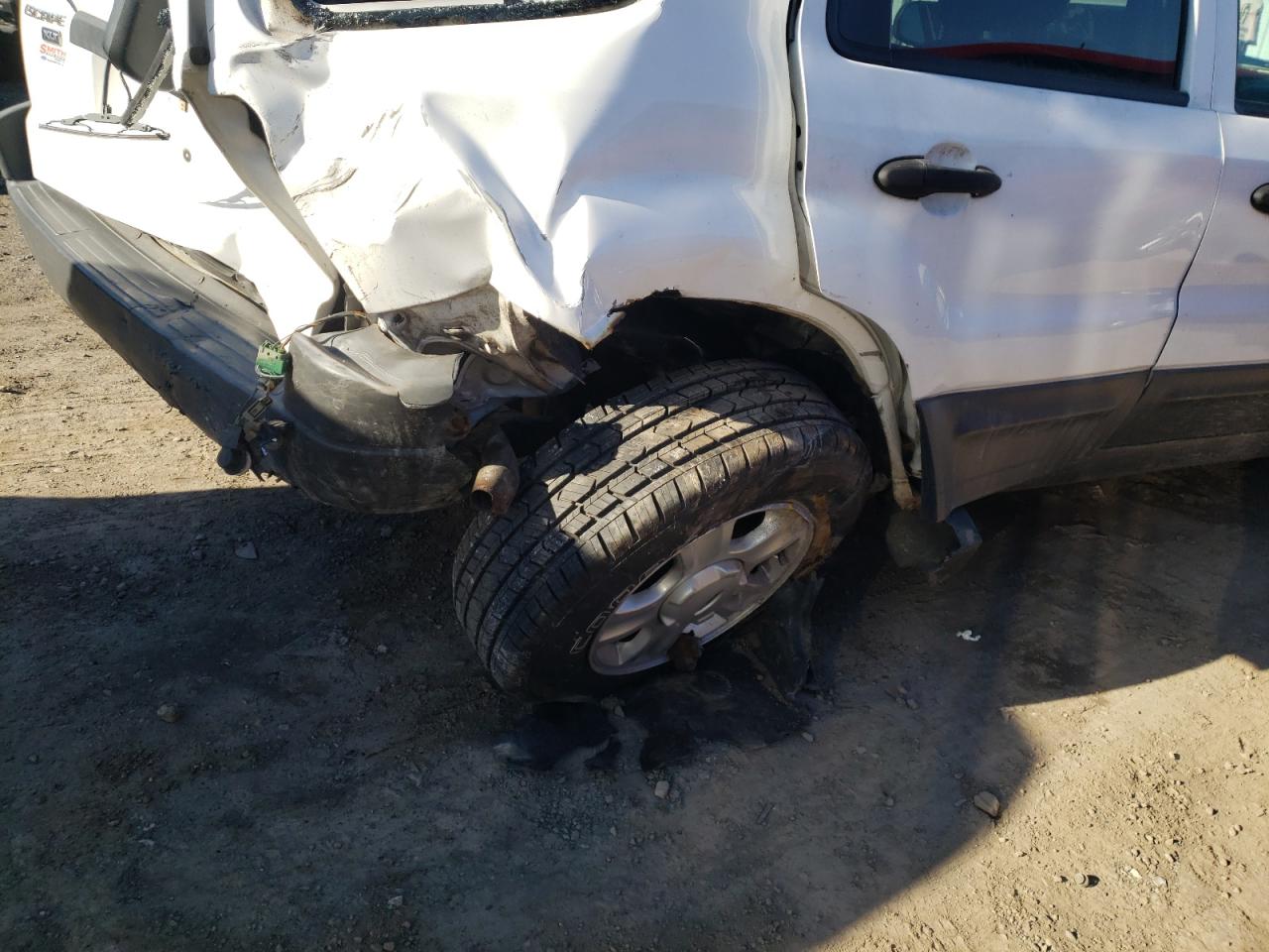 Photo 9 from auction – 2004 FORD ESCAPE XLT with VIN 1FMCU93144KA62758