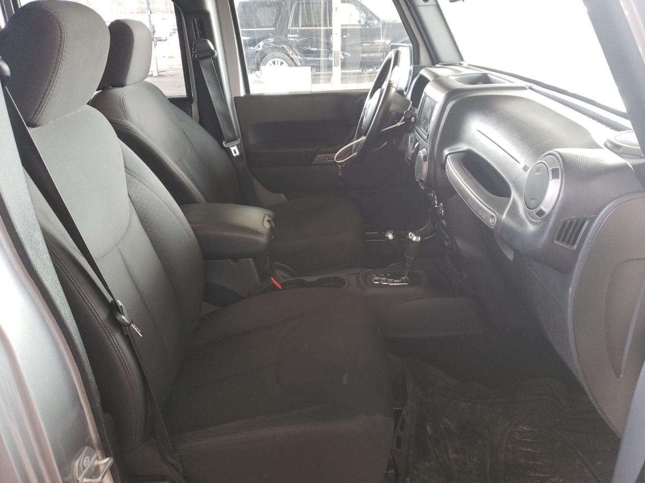 Photo 5 from auction – 2015 JEEP WRANGLER U with VIN 1C4BJWDG9FL726334