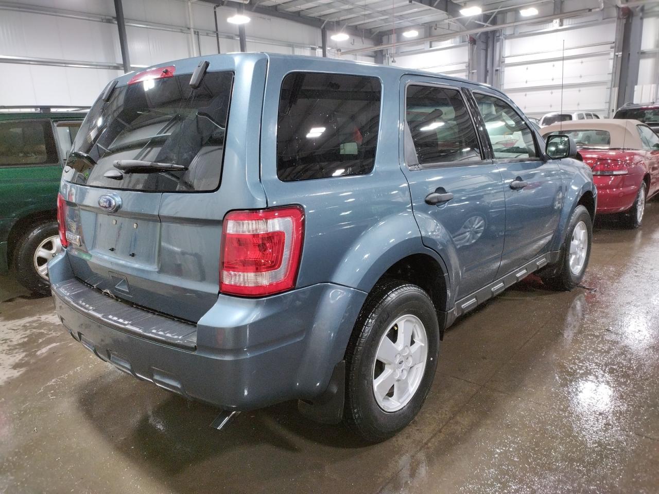 Photo 4 from auction – 2011 FORD ESCAPE XLS with VIN 1FMCU9C77BKC69713