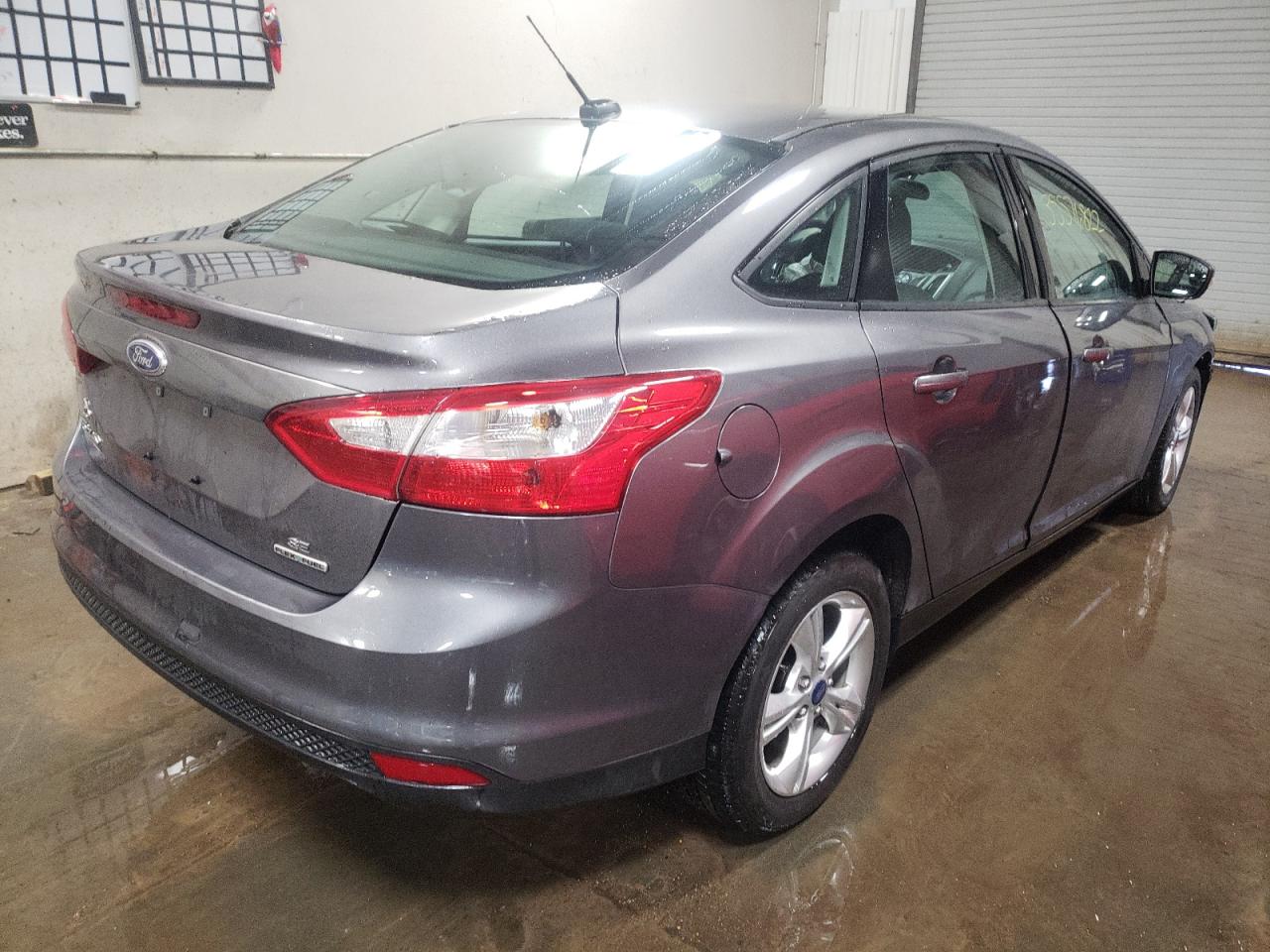 Photo 4 from auction – 2013 FORD FOCUS SE with VIN 1FADP3F25DL289460