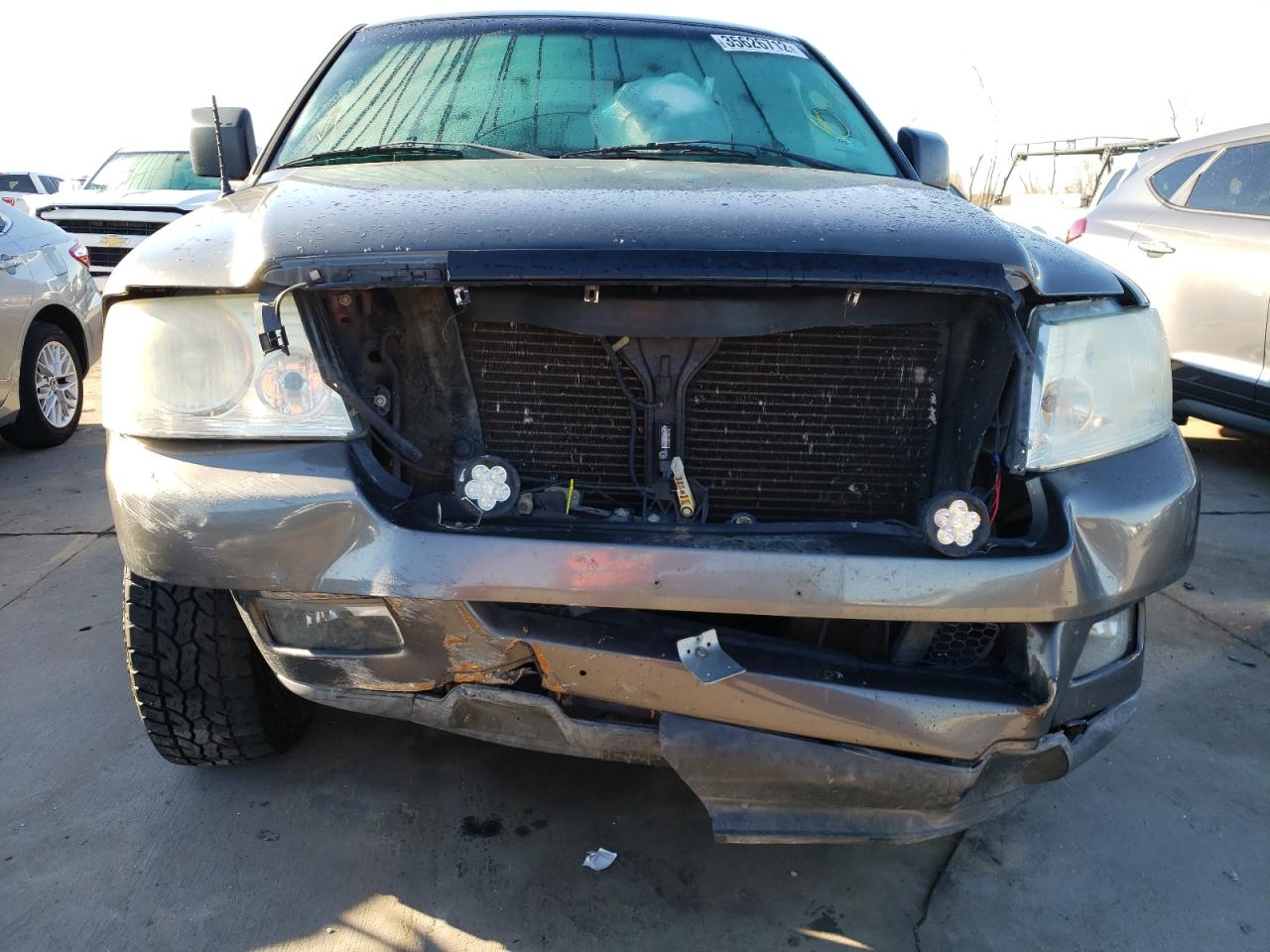 Photo 9 from auction – 2004 FORD F150 with VIN 1FTRF12W94NC57597