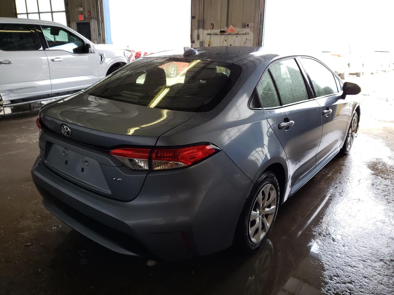 Photo 4 from auction – 2021 TOYOTA COROLLA LE with VIN JTDEPMAE6MJ128200
