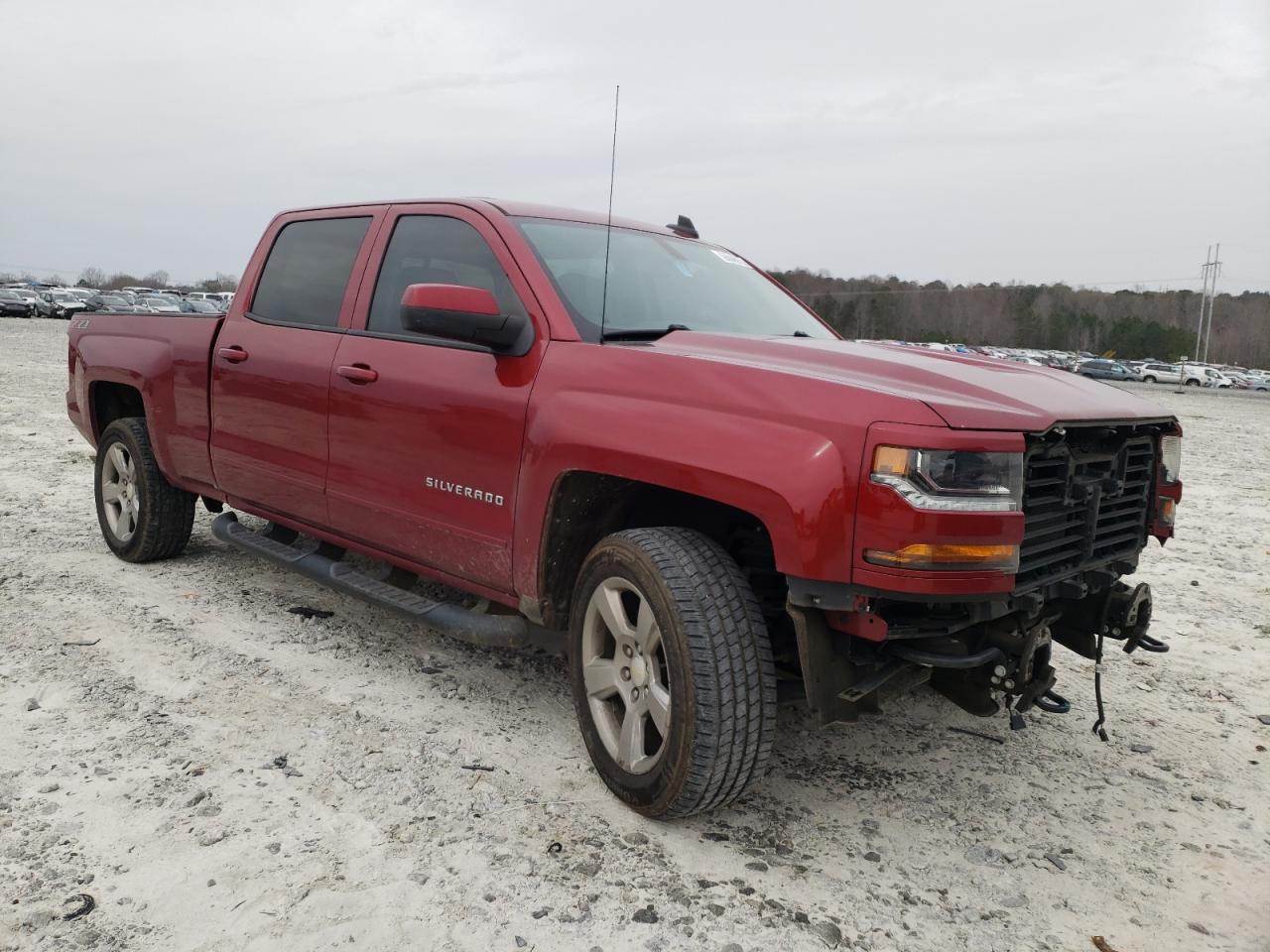 CHEVROLET SILVERADO 2018 with VIN 3GCUKREC5JG213557 - Photo from auction