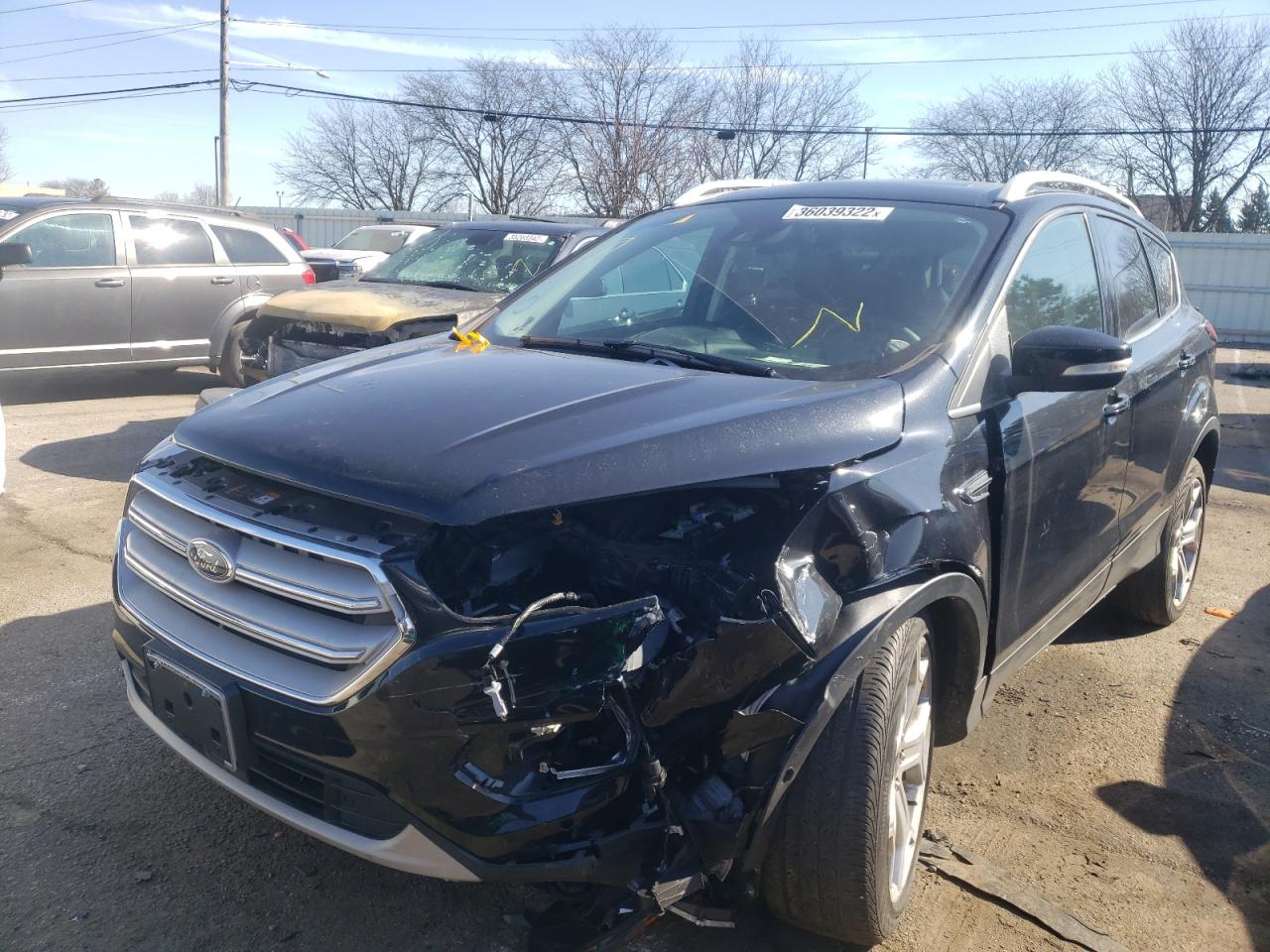 Photo 2 from auction – 2019 FORD ESCAPE TIT with VIN 1FMCU0J96KUC49876