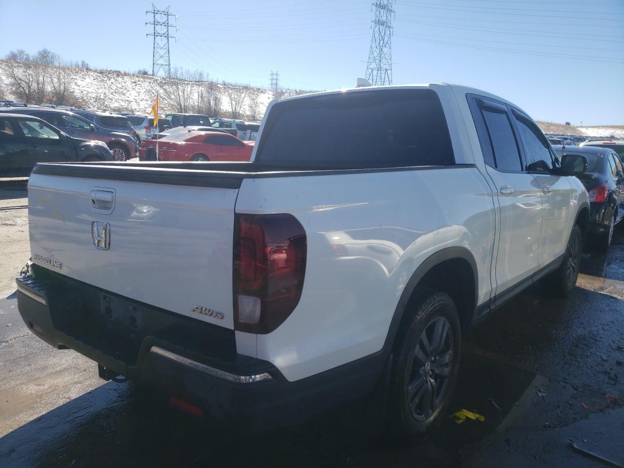 Photo 4 from auction – 2018 HONDA RIDGELINE with VIN 5FPYK3F11JB014353