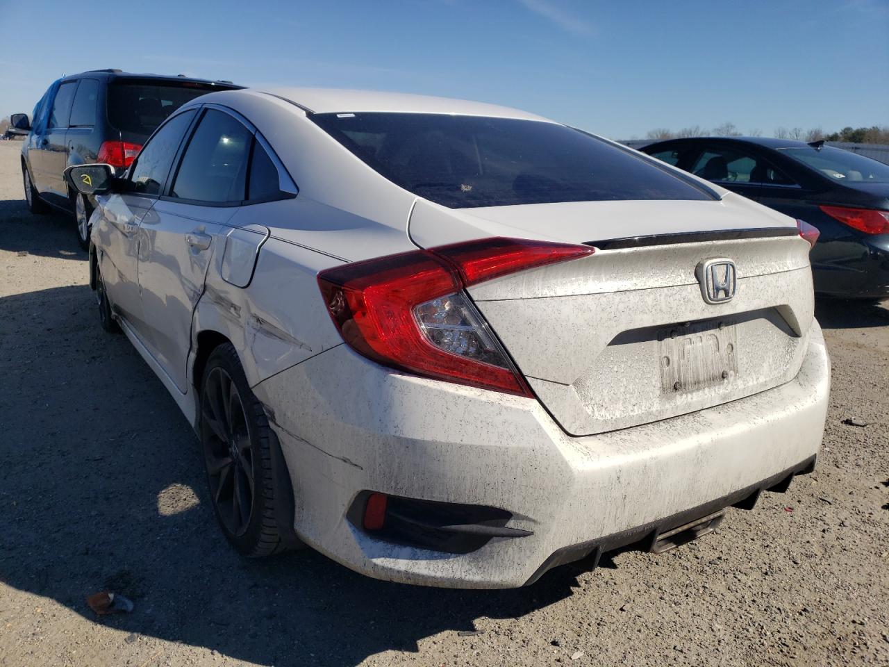 Photo 3 from auction – 2019 HONDA CIVIC SPOR with VIN 2HGFC2F8XKH511337