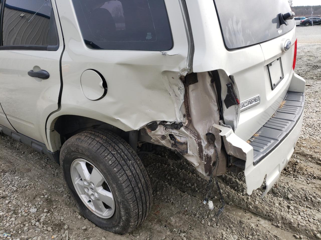 Photo 9 from auction – 2009 FORD ESCAPE XLS with VIN 1FMCU02709KD06026