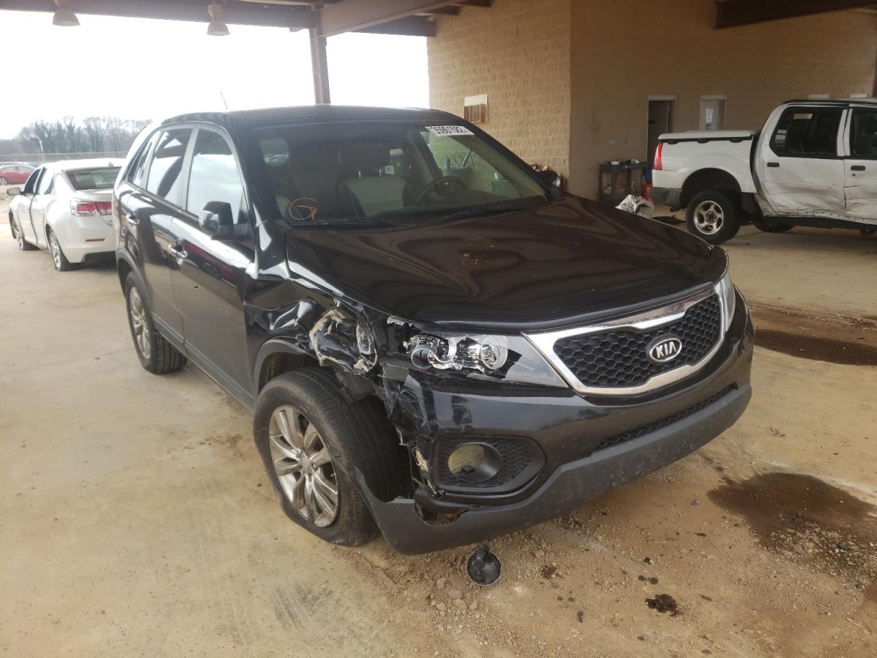 KIA SORENTO EX 2011 with VIN 5XYKU4A1XBG021978 - Photo from auction