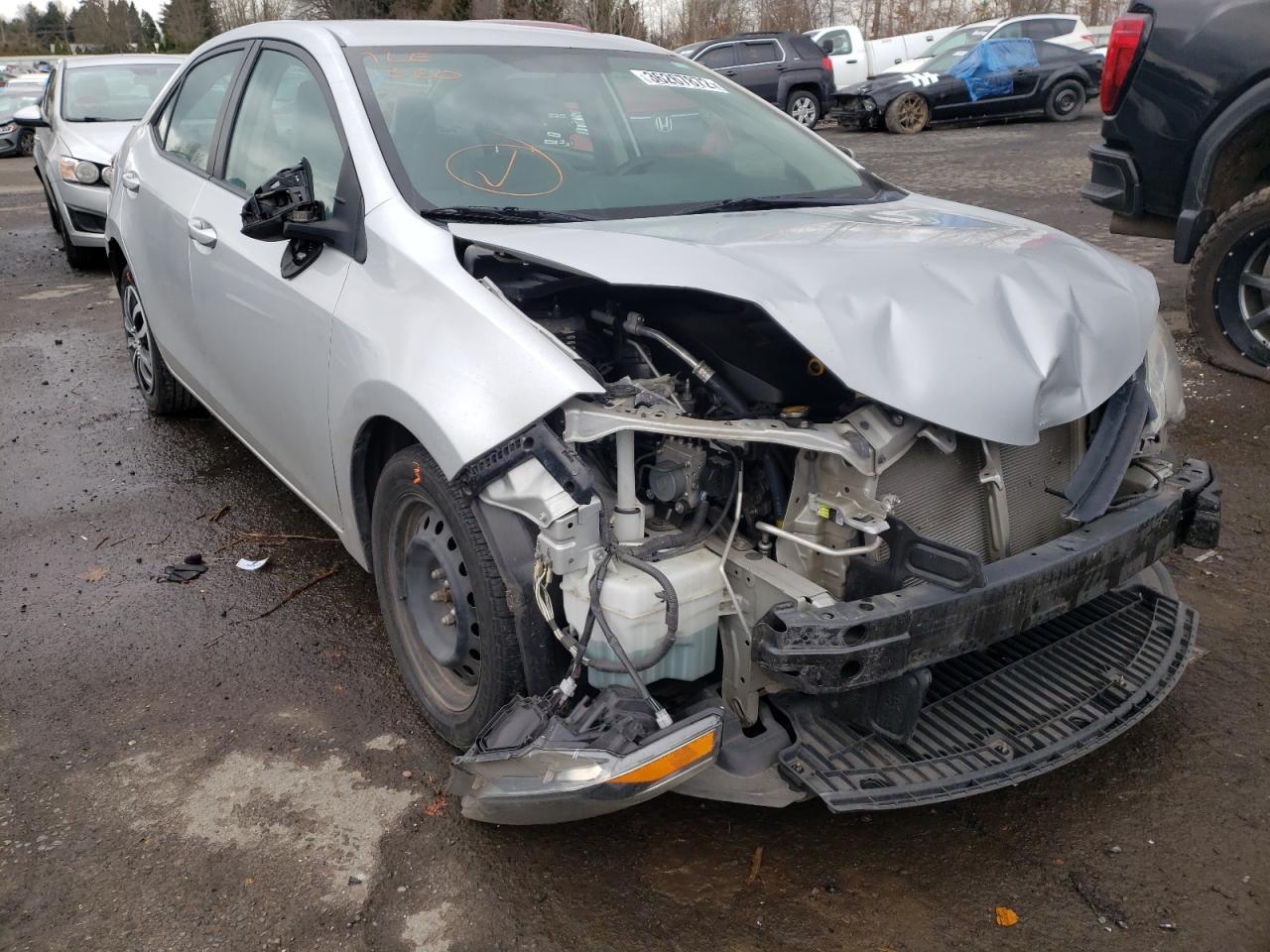 TOYOTA COROLLA L 2014 with VIN 5YFBURHE2EP037310 - Photo from auction