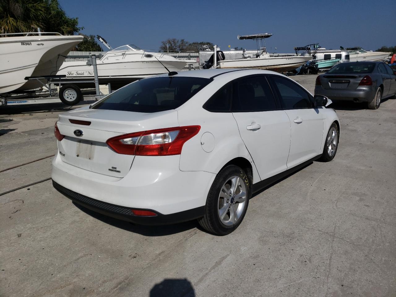Photo 4 from auction – 2014 FORD FOCUS SE with VIN 1FADP3F22EL277817