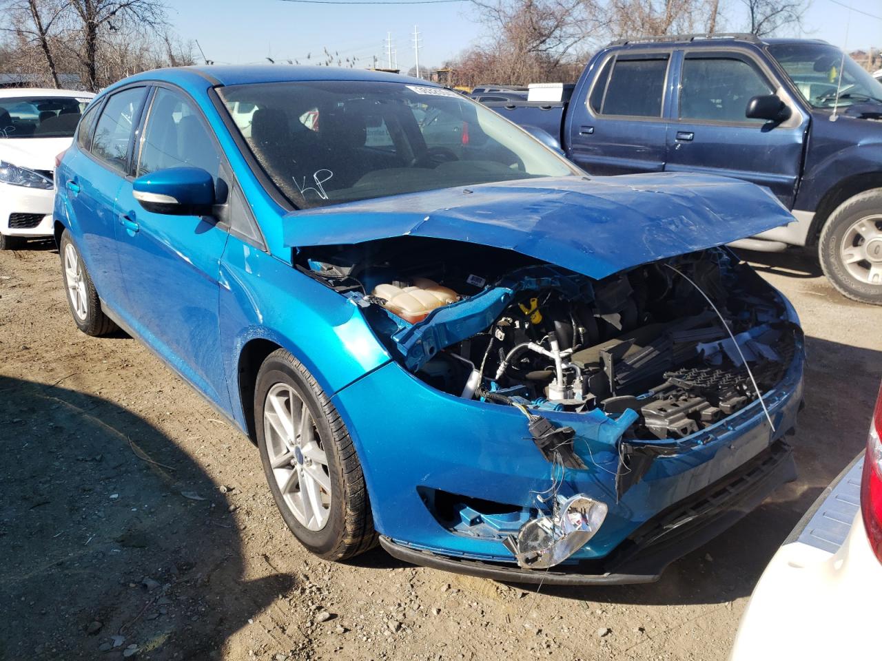 FORD FOCUS SE 2016 with VIN 1FADP3K21GL201563 - Photo from auction
