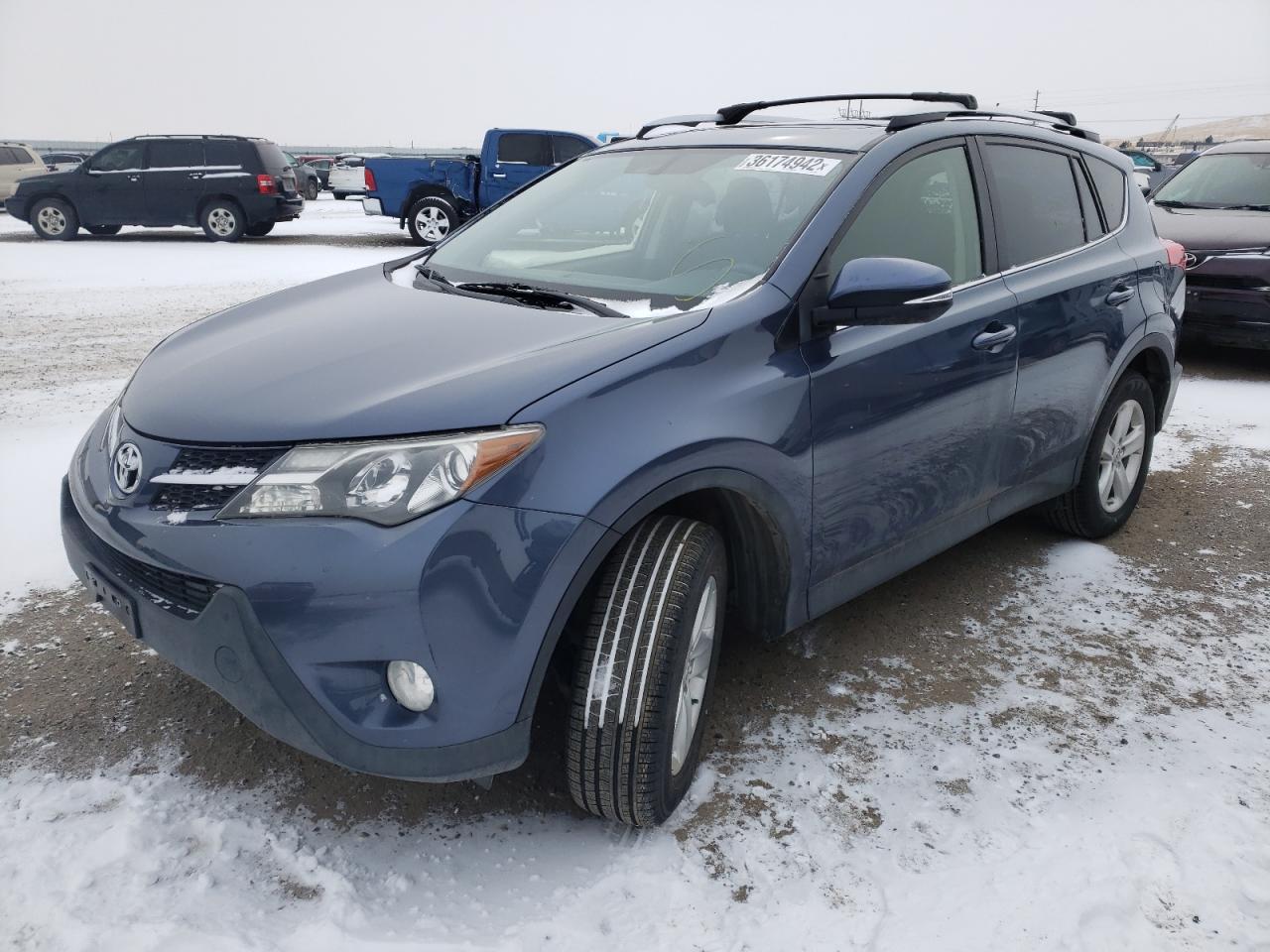 Photo 2 from auction – 2013 TOYOTA RAV4 XLE with VIN JTMRFREV0DD029737