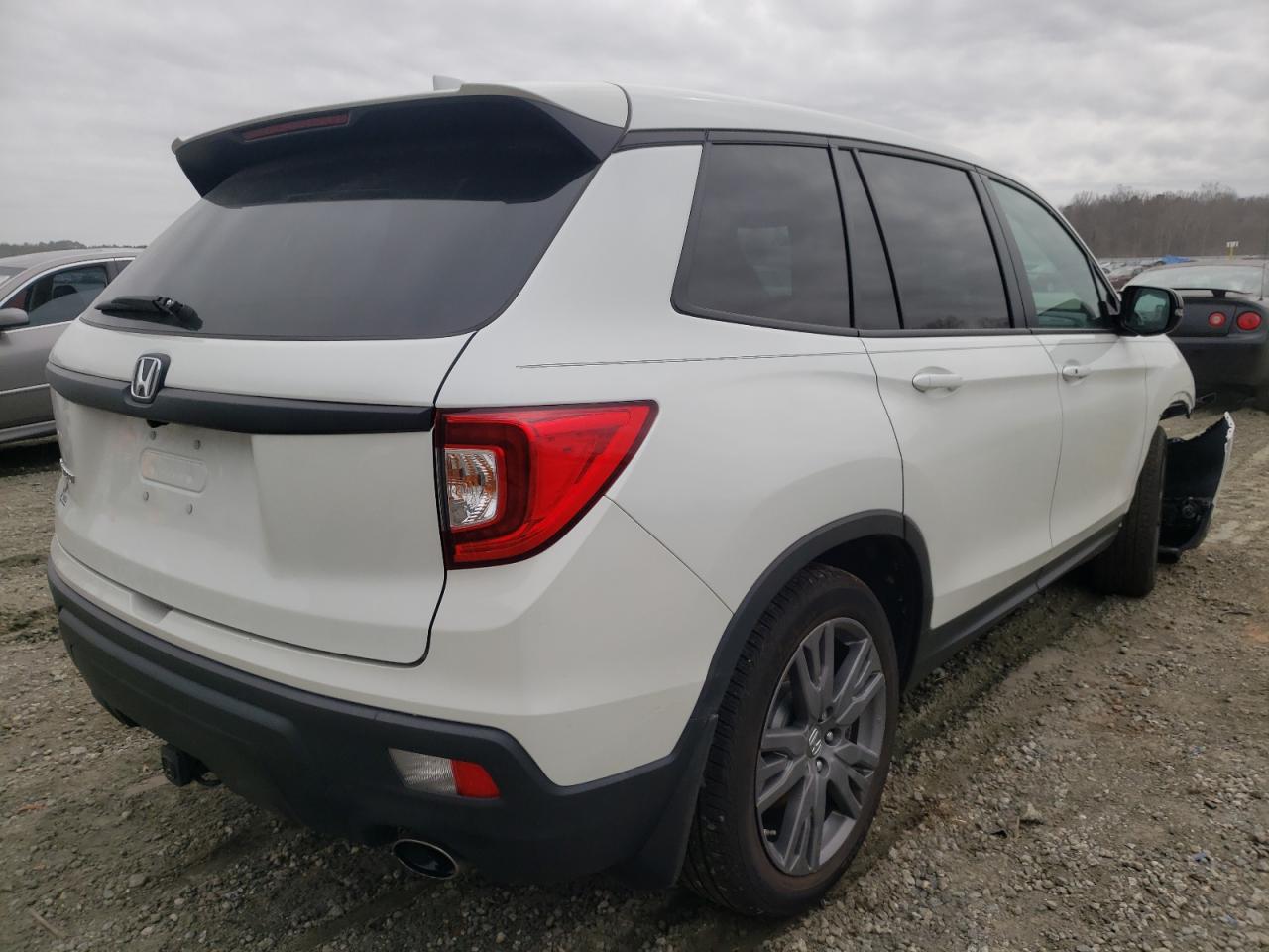 Photo 4 from auction – 2020 HONDA PASSPORT E with VIN 5FNYF7H53LB002373