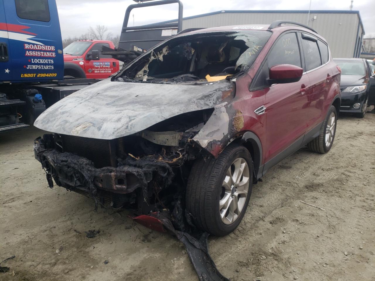 Photo 2 from auction – 2014 FORD ESCAPE SE with VIN 1FMCU0GX5EUB95772