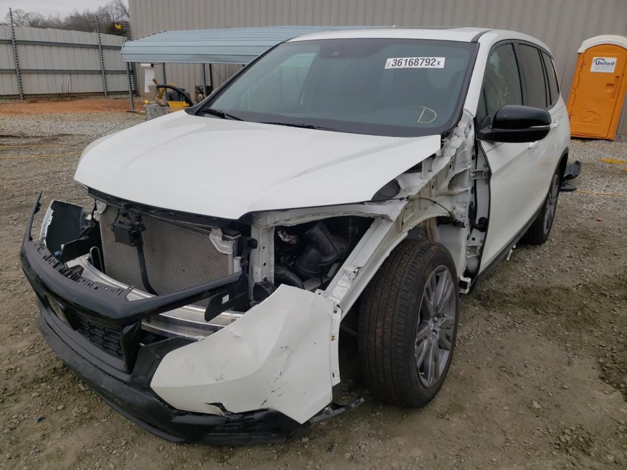 Photo 2 from auction – 2020 HONDA PASSPORT E with VIN 5FNYF7H53LB002373