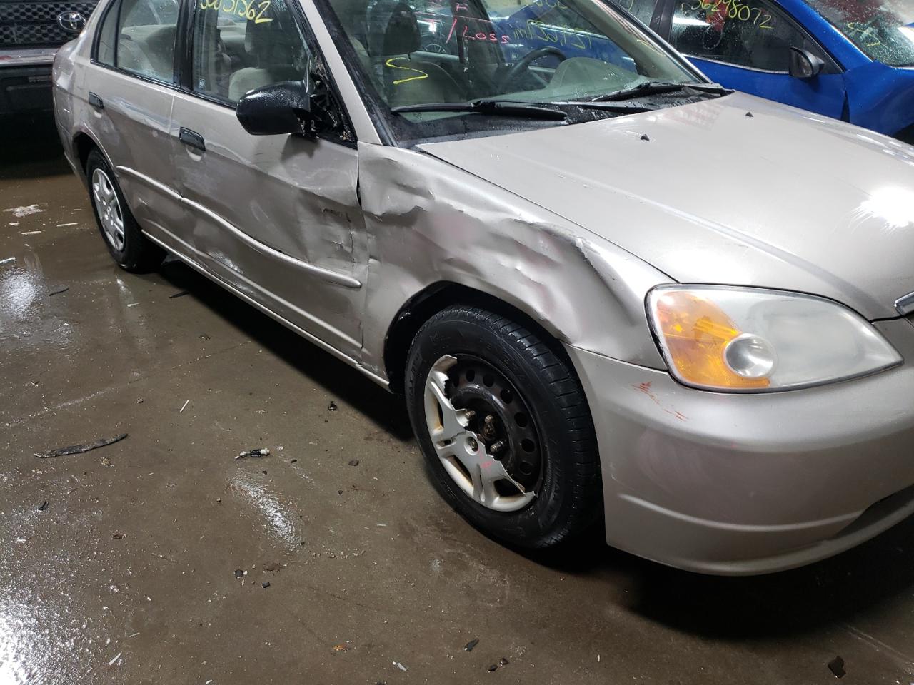 Photo 9 from auction – 2001 HONDA CIVIC LX with VIN 1HGES16561L033658
