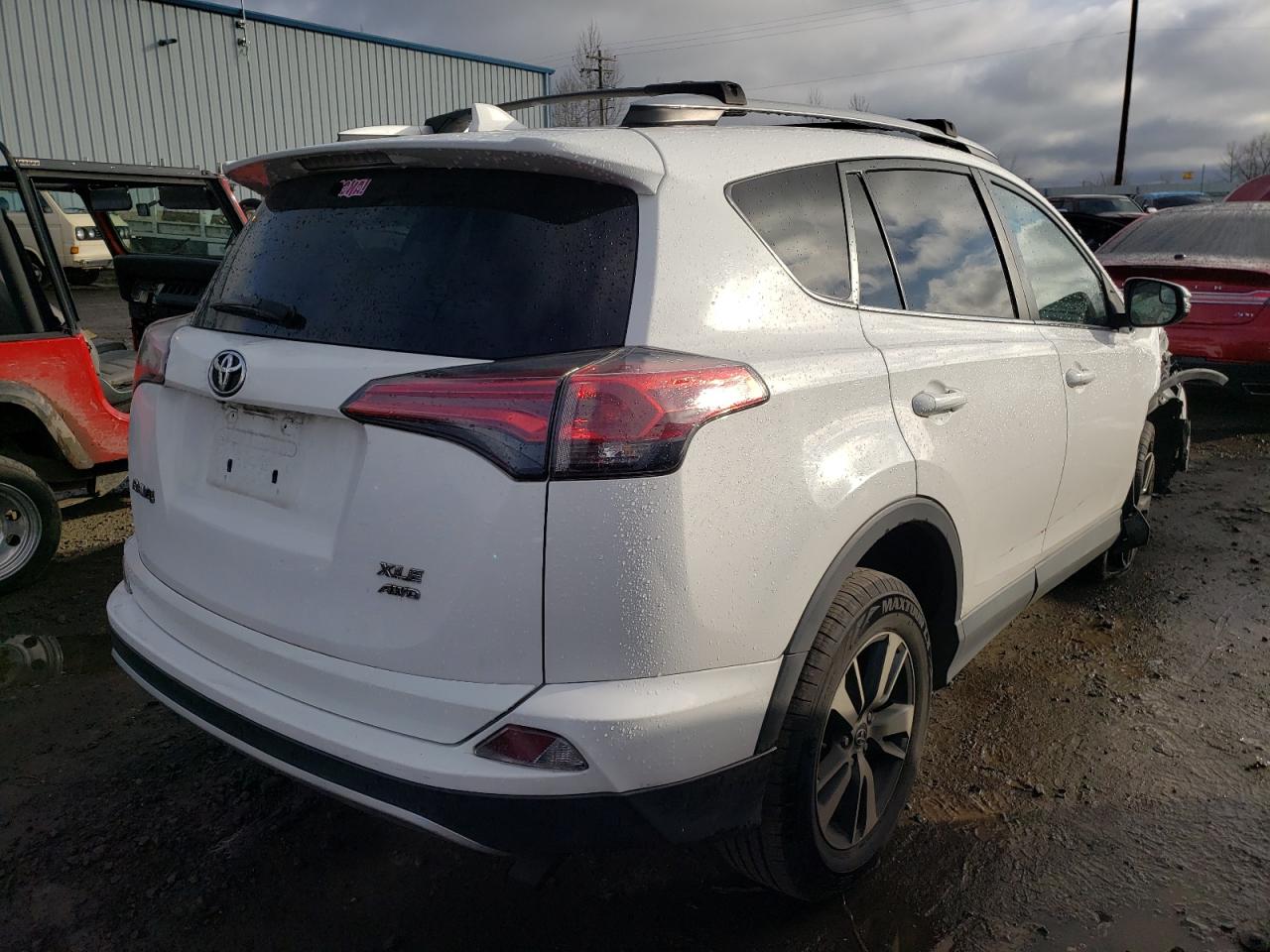 Photo 4 from auction – 2016 TOYOTA RAV4 XLE with VIN 2T3RFREV2GW461835