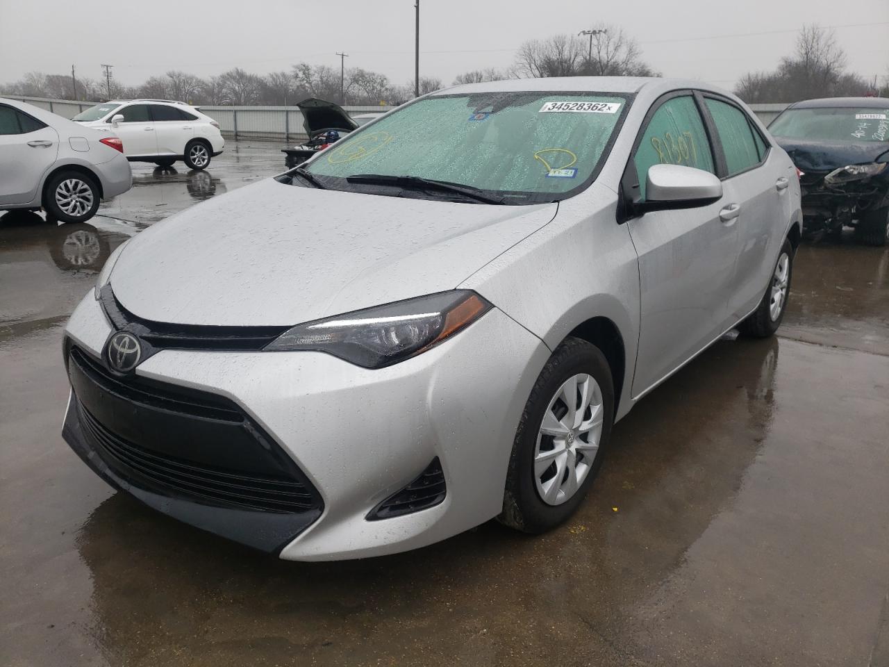 Photo 2 from auction – 2018 TOYOTA COROLLA L with VIN 5YFBURHE9JP765605