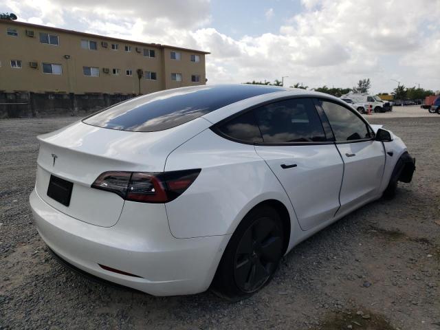 Photo 4 from auction – 2021 TESLA MODEL 3 with VIN 5YJ3E1EA4MF989658