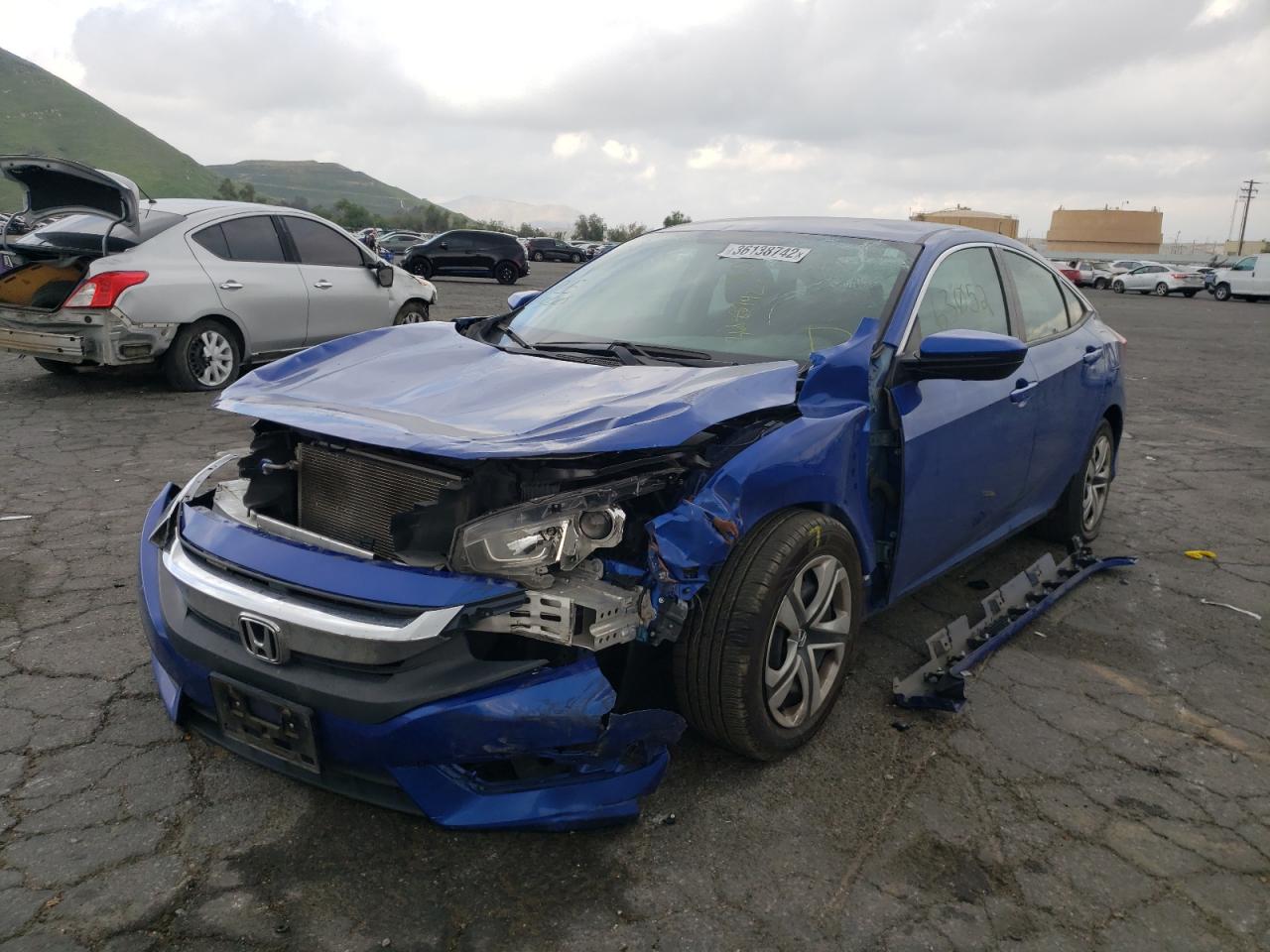 Photo 2 from auction – 2018 HONDA CIVIC LX with VIN 2HGFC2F55JH563365