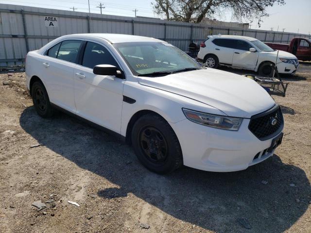 FORD TAURUS POL 2014 with VIN 1FAHP2L80EG154921 - Photo from auction