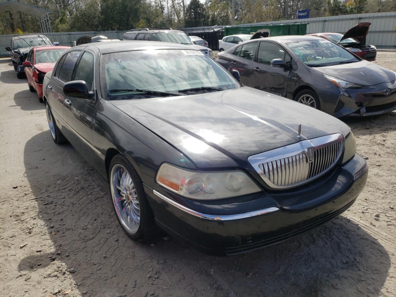 Photo 1 from auction – 2005 LINCOLN TOWN CAR E with VIN 1LNHM84W55Y664951
