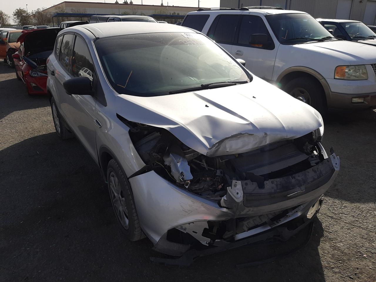 FORD ESCAPE S 2016 with VIN 1FMCU0F77GUC12057 - Photo from auction