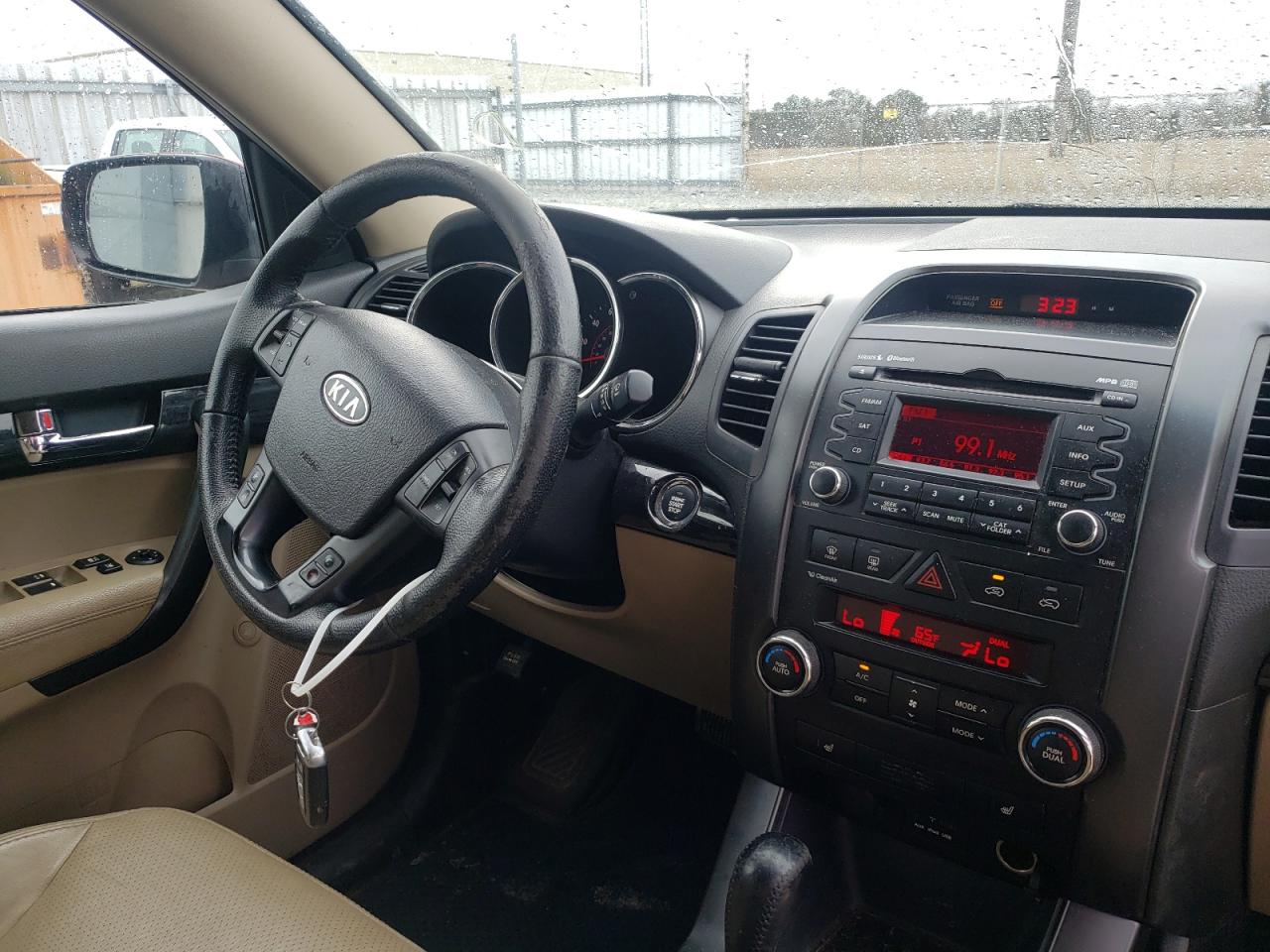 Photo 9 from auction – 2011 KIA SORENTO EX with VIN 5XYKU3A13BG016390
