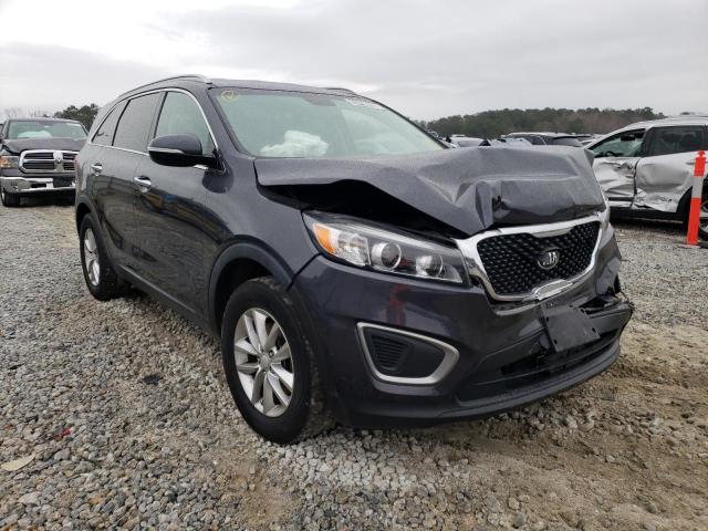 KIA SORENTO LX 2016 with VIN 5XYPG4A32GG097345 - Photo from auction
