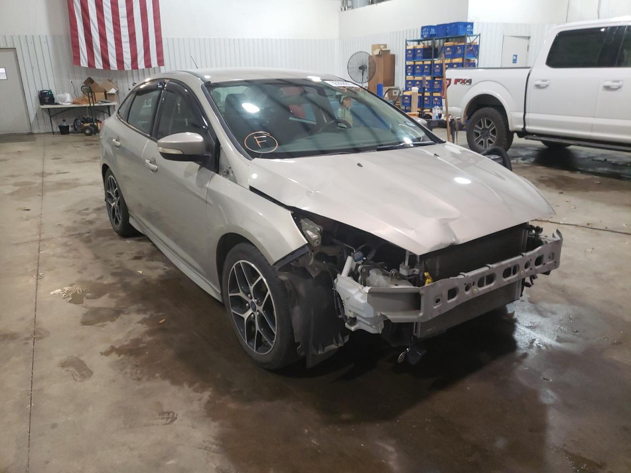 FORD FOCUS SE 2015 with VIN 1FADP3F22FL347673 - Photo from auction