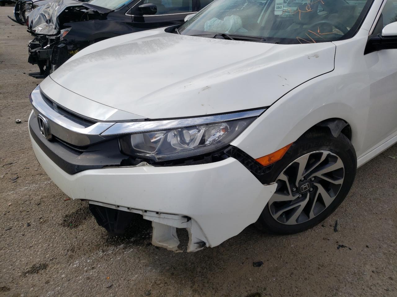 Photo 9 from auction – 2017 HONDA CIVIC EX with VIN 19XFC2F75HE059906