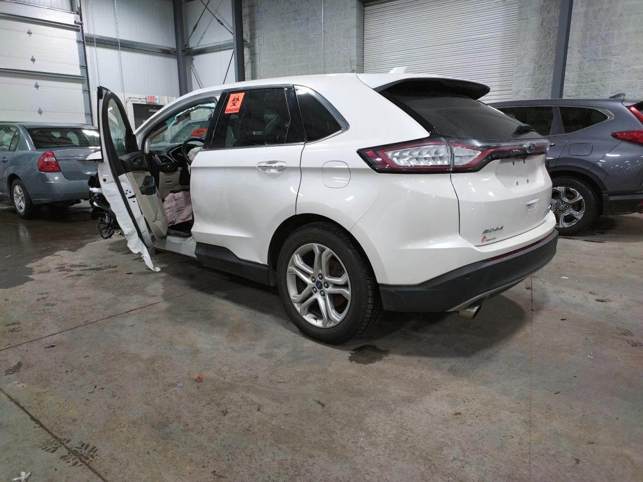Photo 3 from auction – 2016 FORD EDGE TITAN with VIN 2FMPK4K98GBC24844