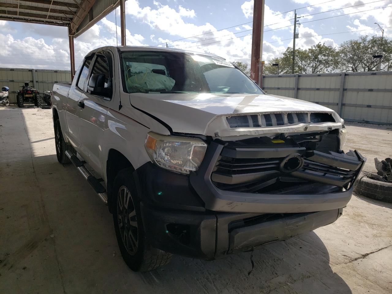 TOYOTA TUNDRA DOU 2014 with VIN 5TFRU5F13EX033159 - Photo from auction