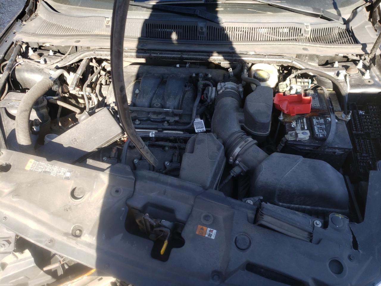 Photo 7 from auction – 2014 FORD TAURUS POL with VIN 1FAHP2MK2EG111921