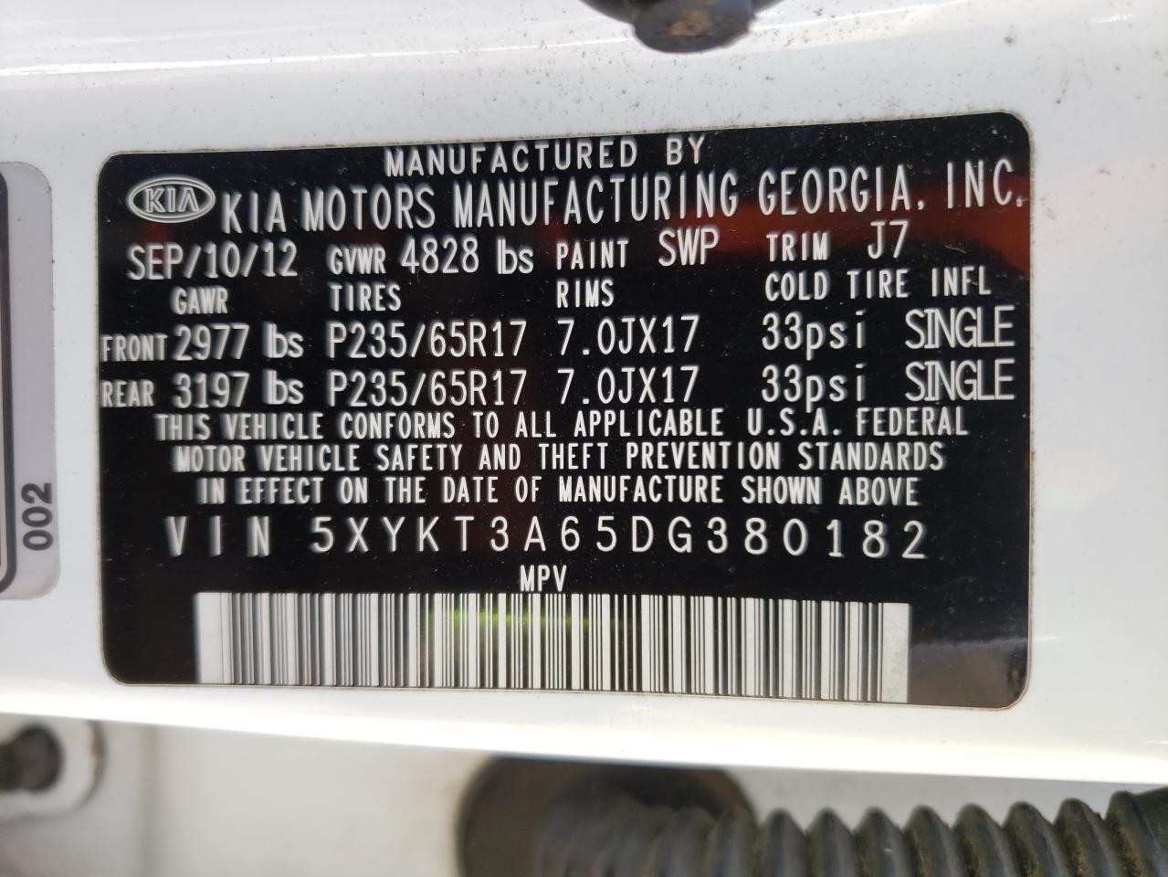 Photo 10 from auction – 2013 KIA SORENTO LX with VIN 5XYKT3A65DG380182
